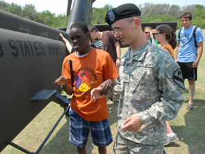 Visually impaired campers explore Army helicopter
